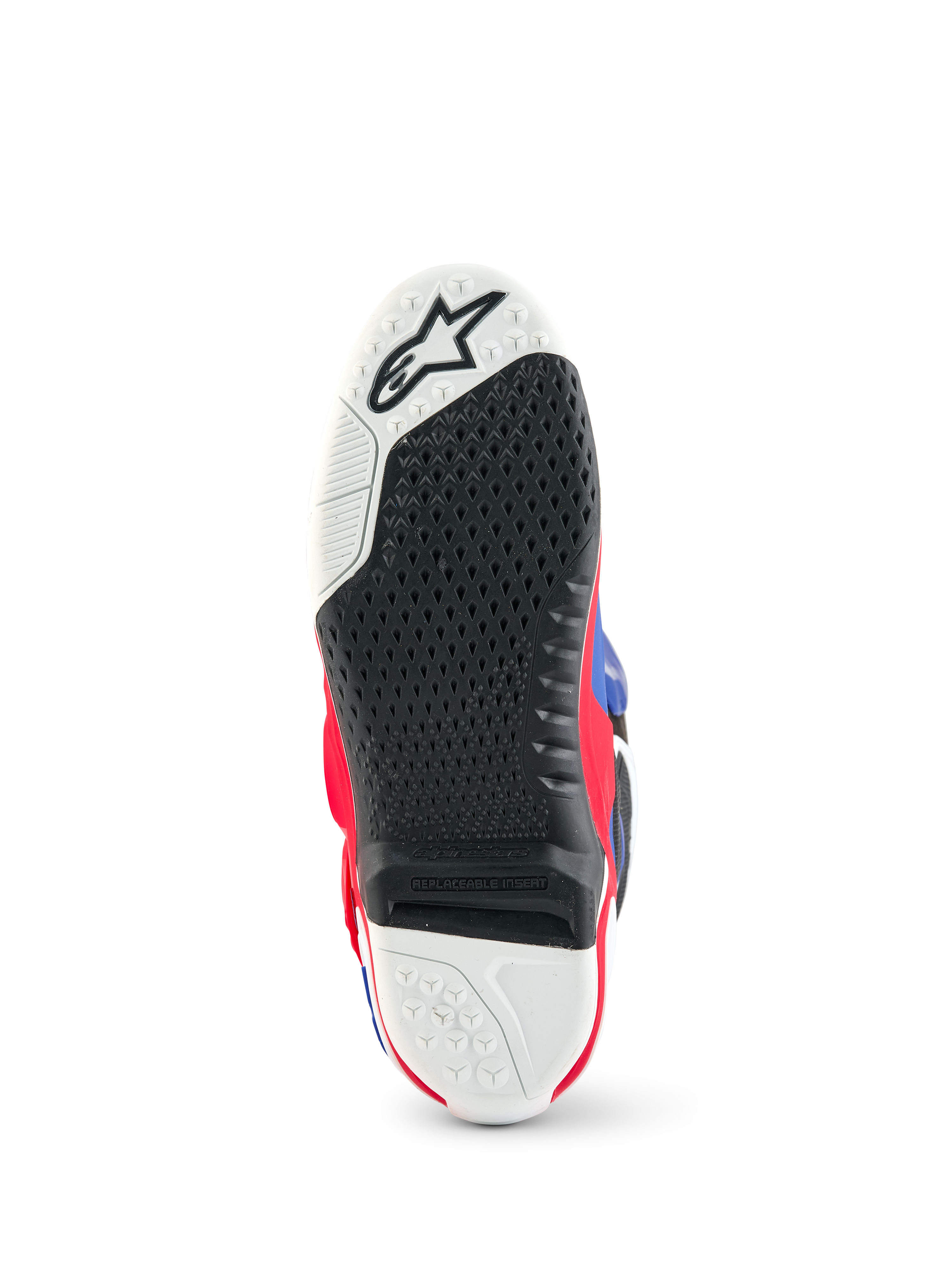 Alpinestars Limited Edition Fortitude Tech 10, vue de la semelle de la botte de motocross, motif d'adhérence texturé noir et blanc, insert central remplaçable, accents rouge, blanc et bleu, construction durable pour des performances tout-terrain