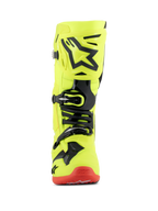 Bottes Alpinestars Tech 10, bottes de motocross, jaune fluo, noir et rouge fluo, vue de face, châssis jaune fluo brillant avec accents en TPU noir et système de boucles, semelle rouge, équipement de course tout-terrain de pointe