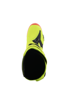 Bottes Alpinestars Tech 10, bottes de motocross, jaune fluo, noir et rouge fluo, vue de dessus montrant l'ouverture intérieure et la zone des orteils, couleurs fluo éclatantes avec des accents noirs, chaussures de course tout-terrain professionnelles.