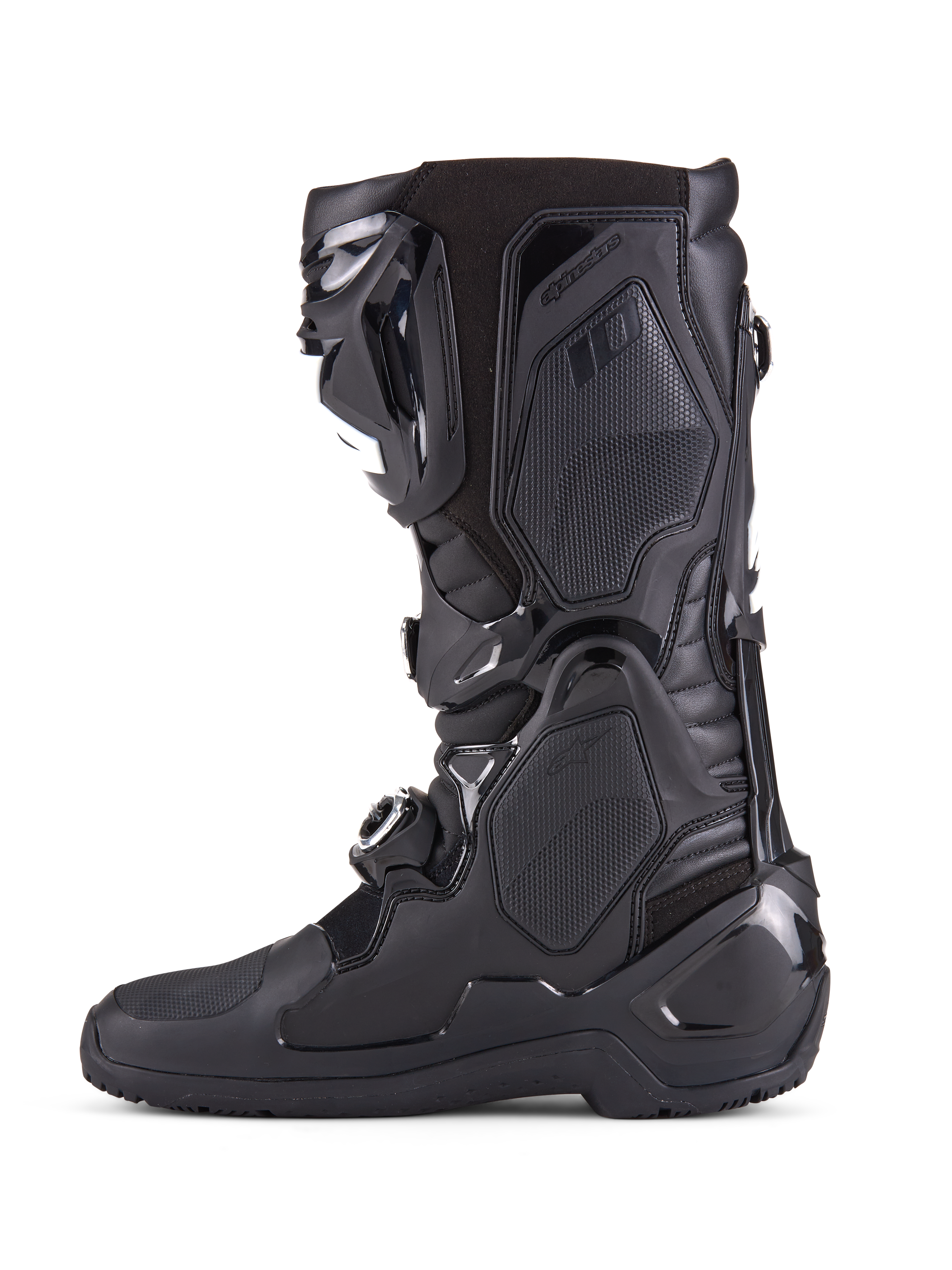 Bottes Alpinestars Tech 10 Enduro, noir, vue de profil de botte de motocross haute performance, avec panneaux de protection en TPU durable, système de fermeture à trois boucles et contrôle de flexion avancé pour la course tout-terrain