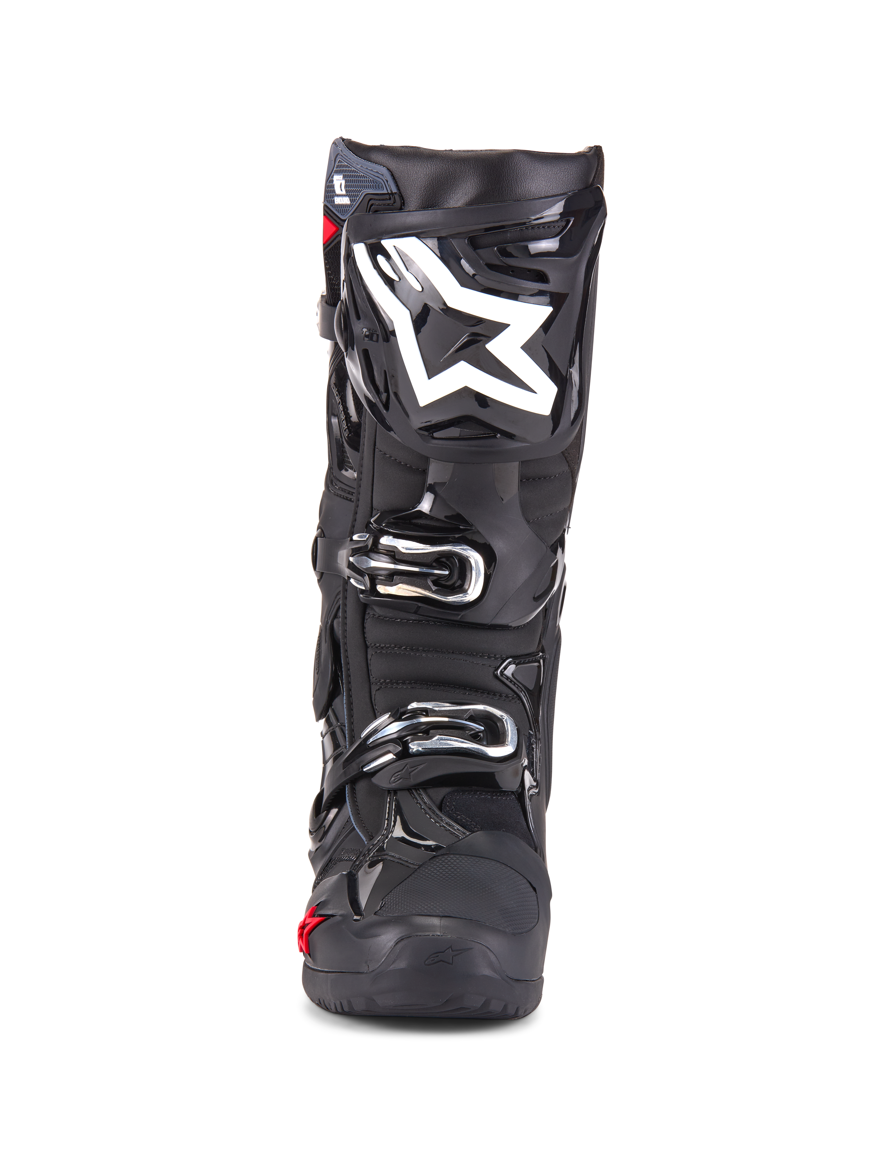 Bottes Alpinestars Tech 10 Enduro, bottes de motocross, noires, vue de face montrant le logo étoile blanc sur le tibia, boucles argentées, finition noire élégante avec panneaux de protection robustes, chaussures haute performance pour la conduite tout-terrain