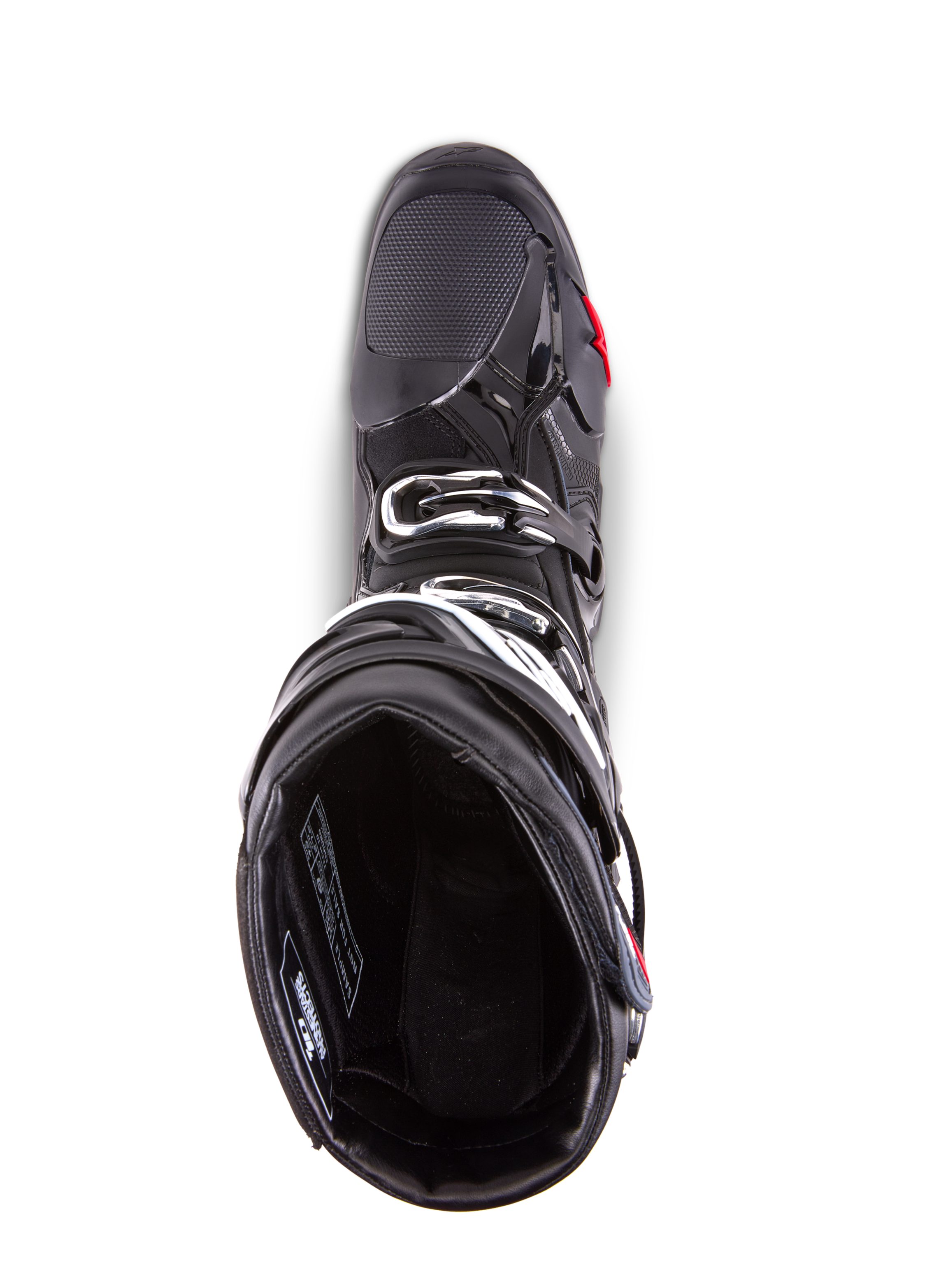Bottes Alpinestars Tech 10 Enduro, bottes de motocross, noir, vue de dessus montrant la doublure intérieure, le système de fermeture à triple boucle et la zone des orteils renforcée, conçues pour la haute performance en tout-terrain et en compétition enduro