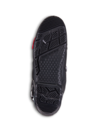 Bottes Alpinestars Tech 10 Enduro, bottes de motocross noires, vue détaillée de la semelle extérieure bi-composant présentant un dessin de semelle agressif, le marquage Alpinestars et une section d'insert remplaçable pour la performance tout-terrain