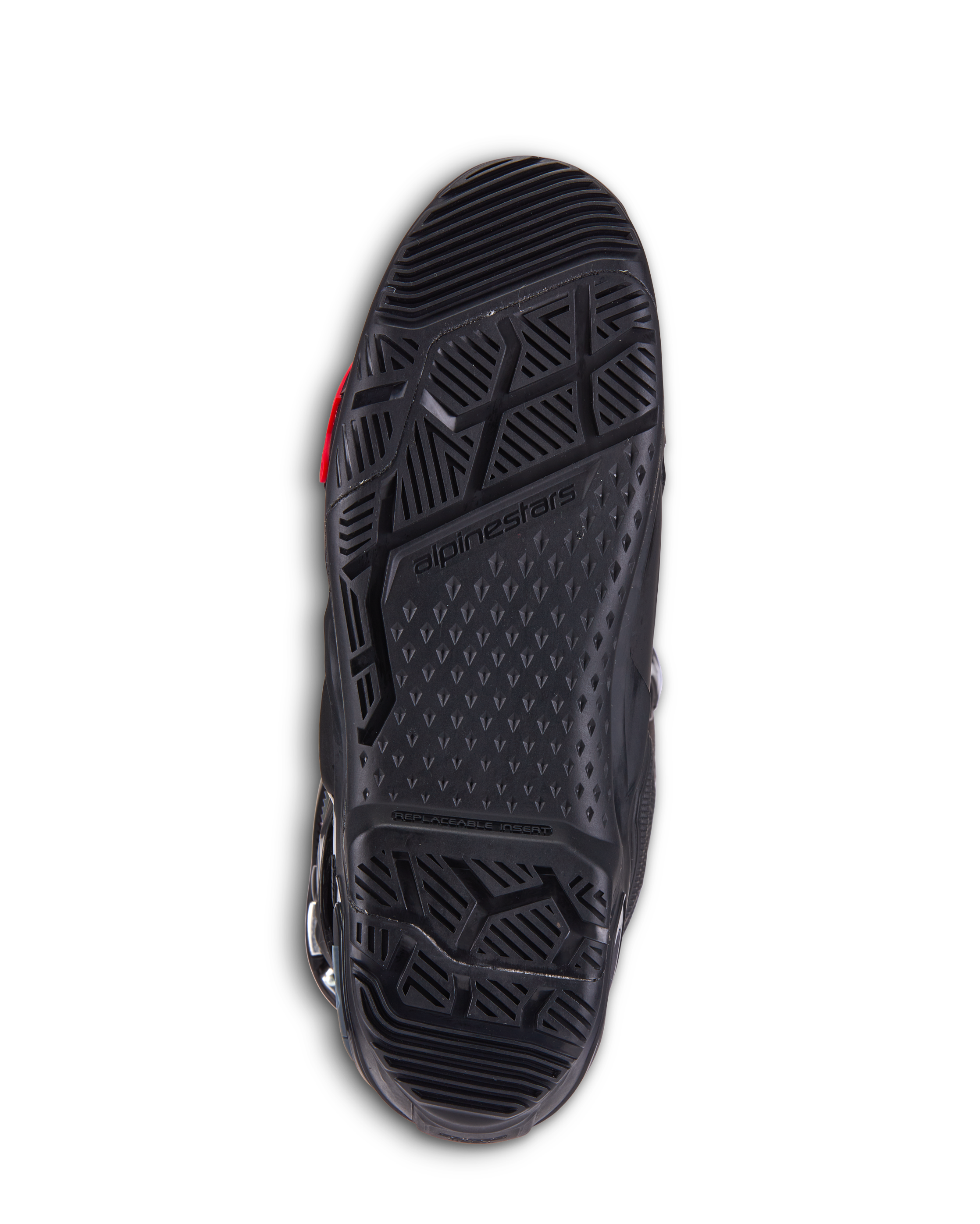Bottes Alpinestars Tech 10 Enduro, bottes de motocross noires, vue détaillée de la semelle extérieure bi-composant présentant un dessin de semelle agressif, le marquage Alpinestars et une section d'insert remplaçable pour la performance tout-terrain