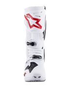 Alpinestars Tech 10 Supervented Boots, White and Bright Red, front view showing ventilated perforated panels, large red star logo on the shin plate, adjustable silver buckles, and high-performance motocross design.