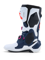 Bottes Alpinestars Tech-10 Supervented, bottes de motocross bleu foncé et blanches, accents fuchsia, coque en TPU ventilée.