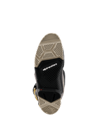 Bottes Alpinestars Tech 7 Enduro Drystar® 2026, vue de dessous montrant la semelle à double composé, motifs de crampons spécialisés beige et noir pour une adhérence maximale, avec logo Alpinestars blanc et indicateur de limite d'usure rouge.