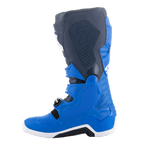 Bottes Alpinestars Tech 7, bottes de motocross, bleu alpin, bleu marine nuit et rouge vif, vue latérale médiale montrant les panneaux de protection en TPU et la construction renforcée pour la course tout-terrain
