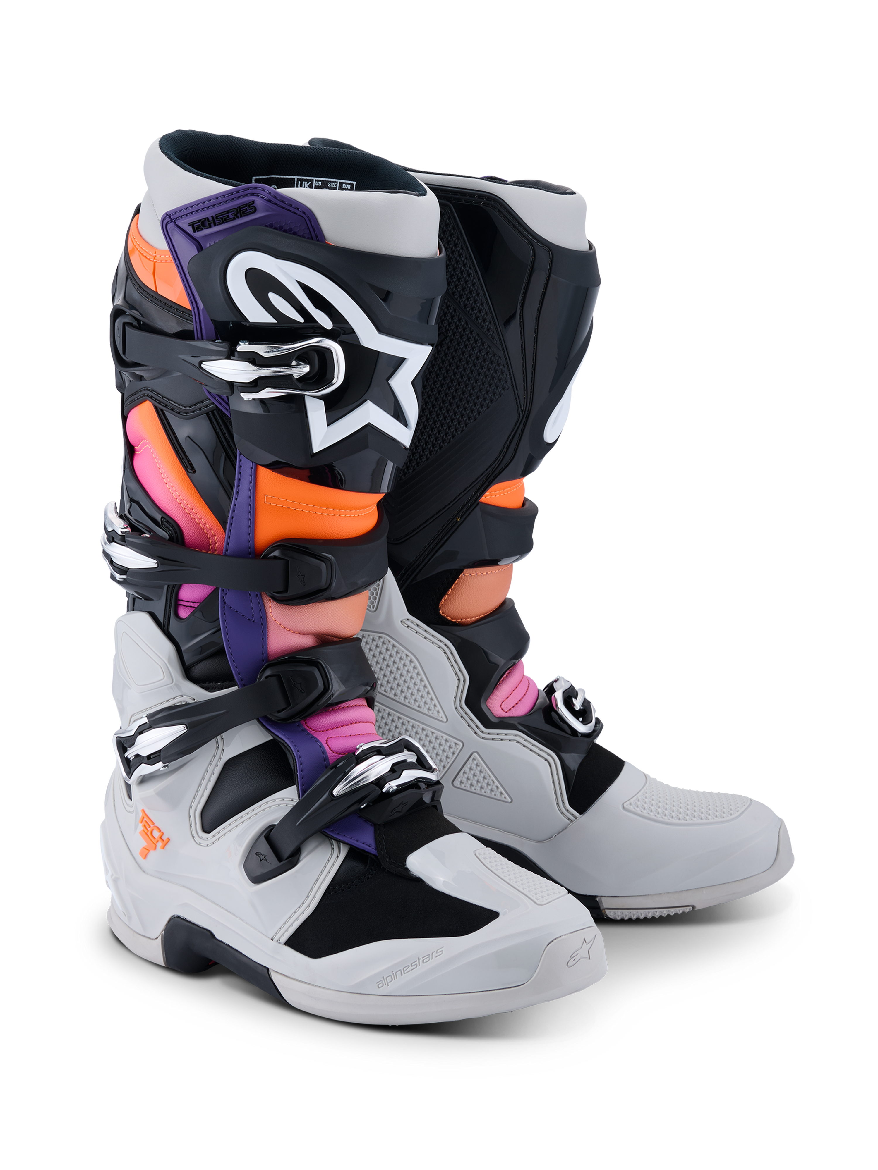 Alpinestars Tech 7 Boots, Motocross Boots, Black, Light Gray, Orange Fluo, and Magenta, featuring a multi-buckle closure system, reinforced TPU shell, and high-contrast branding, designed for professional off-road racing and protection.