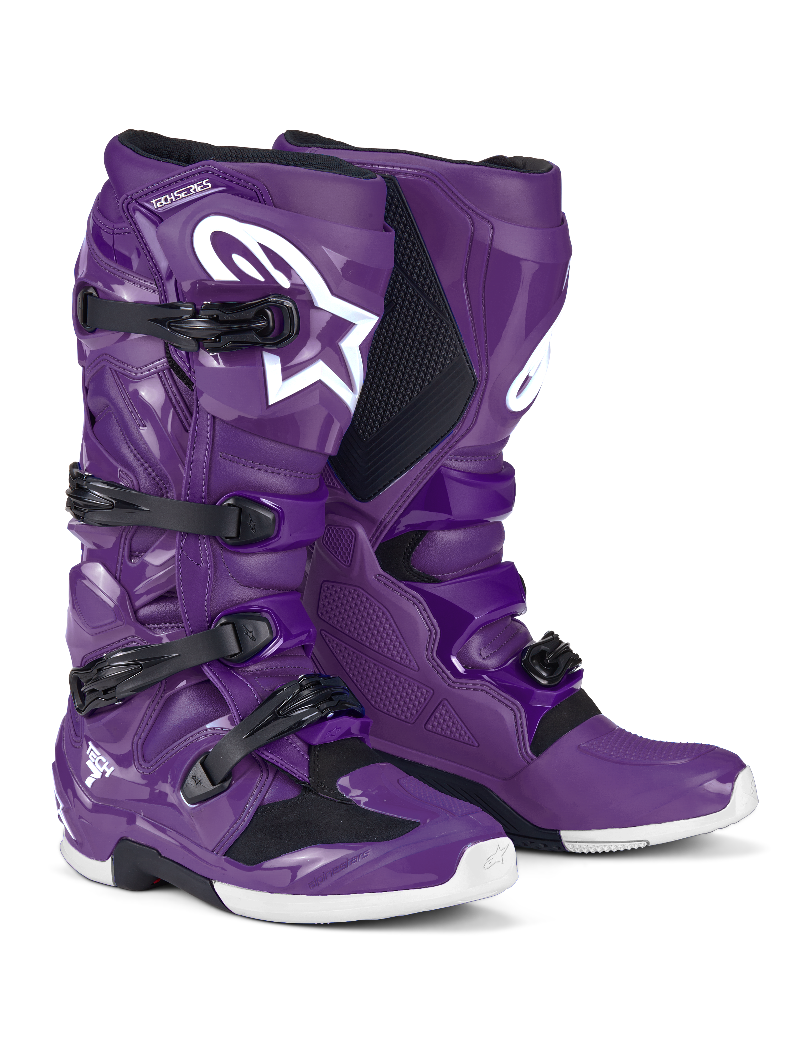 Bottes Alpinestars Tech 7, bottes de motocross, pourpre, dotées de boucles noires et d'un grand logo Astars blanc, conception protectrice haute performance avec fermeture à quatre sangles et coque en TPU durable pour les courses tout-terrain