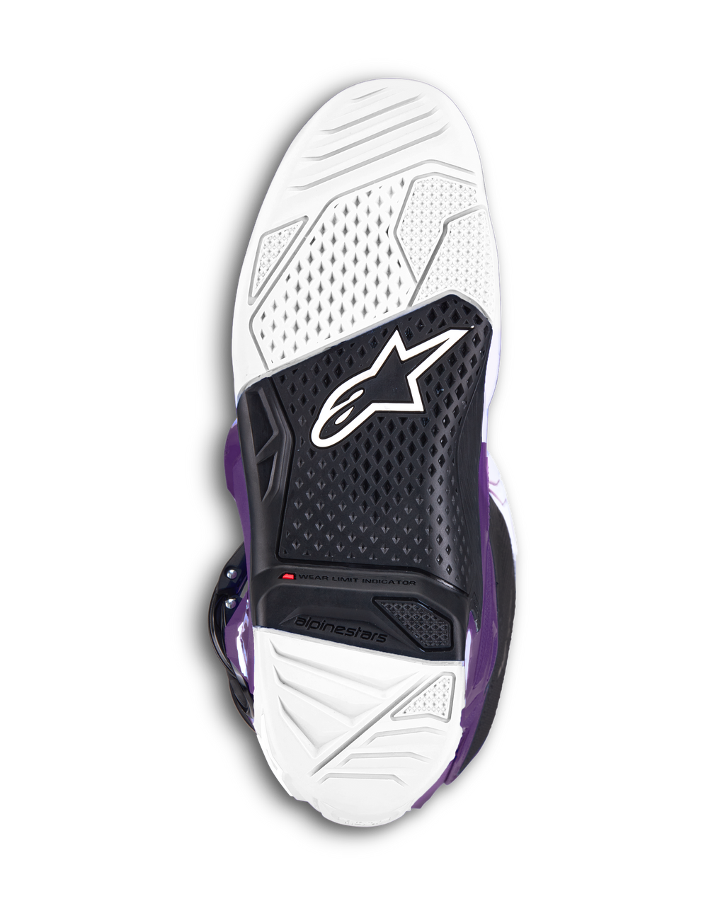 Bottes Alpinestars Tech 7, bottes de motocross pourpres, vue de la semelle montrant le caoutchouc vulcanisé bi-composé blanc et noir, avec le logo Alpinestars et un indicateur de limite d'usure rouge visible pour les performances tout-terrain.