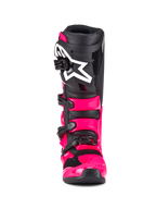 Alpinestars Tech 7 Boots, Motocross Boots, Diva Pink Black, front view, featuring a bright pink TPU shell and straps, black shin plate with a large white Alpinestars star logo, and secure black buckles.