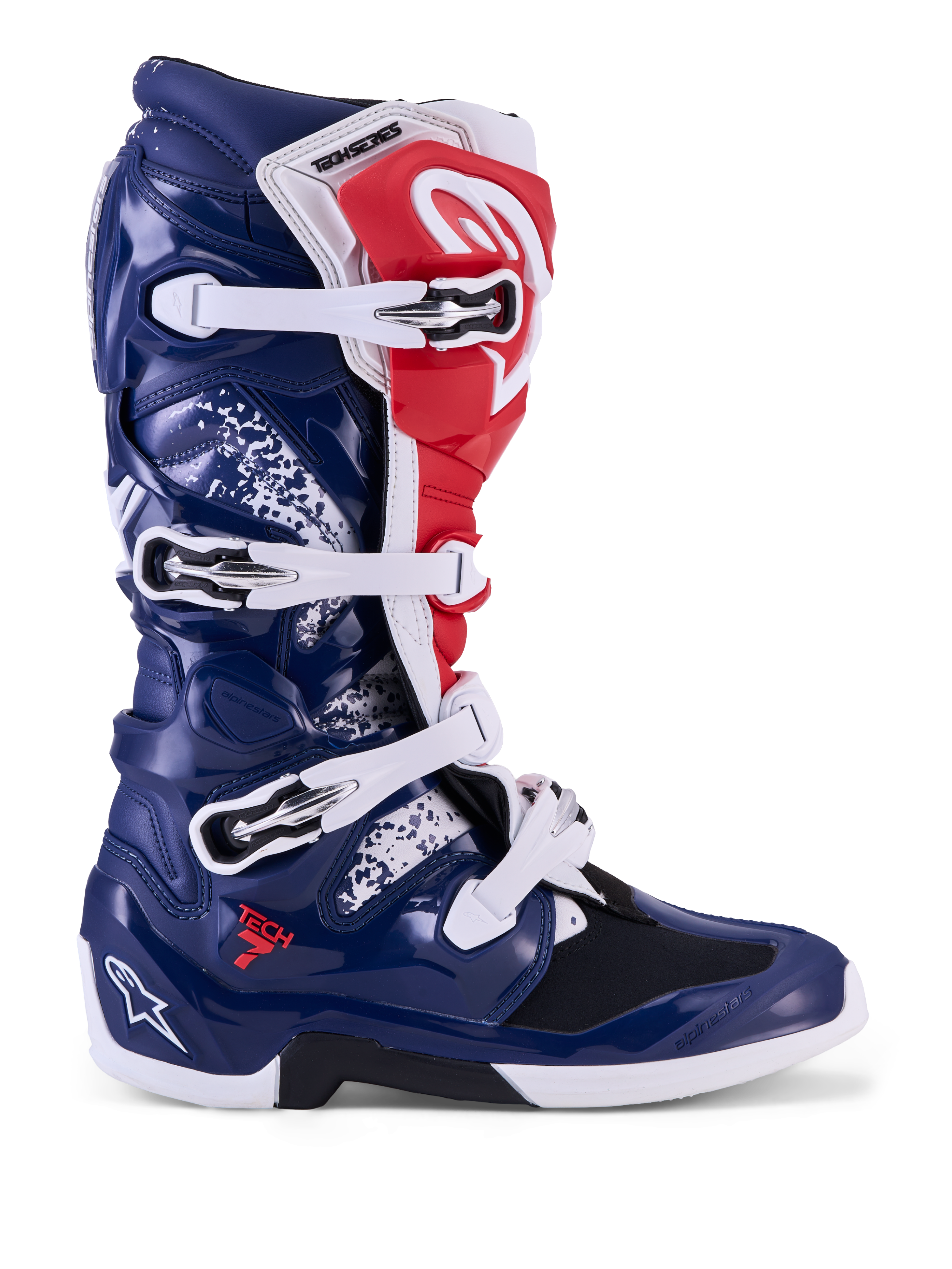 Alpinestars Tech 7 Unity, bottes de motocross pour homme, bleues, blanches et rouges, coque en TPU et fermeture à boucles.
