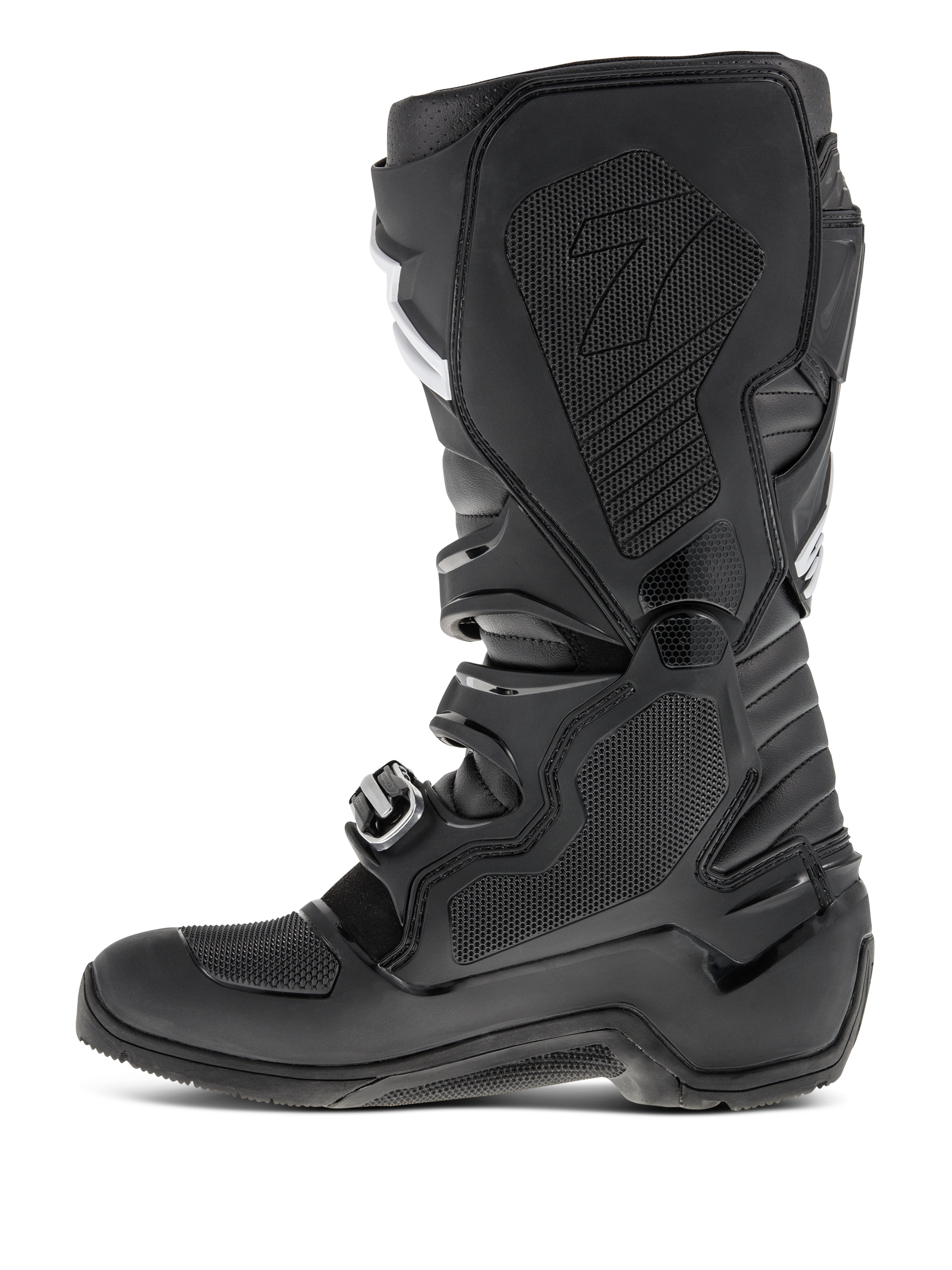Alpinestars Tech 7 Enduro Boots, Black, side profile view highlighting the medial side with honeycomb rubber insert, protective TPU panels and buckle closure system for off-road motocross performance.