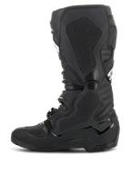 Alpinestars Tech 7 Enduro Drystar® Boots, Black, side profile view showing the medial side with textured honeycomb grip panels and the '7' logo, waterproof off-road motorcycle footwear for enduro racing.
