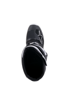 Bottes Alpinestars Tech 7 Enduro Drystar®, noir et blanc, vue de dessus de l'ouverture de la botte, logo A-star blanc sur la pointe, doublure de col blanche, conception imperméable haute performance pour la pratique de l'enduro