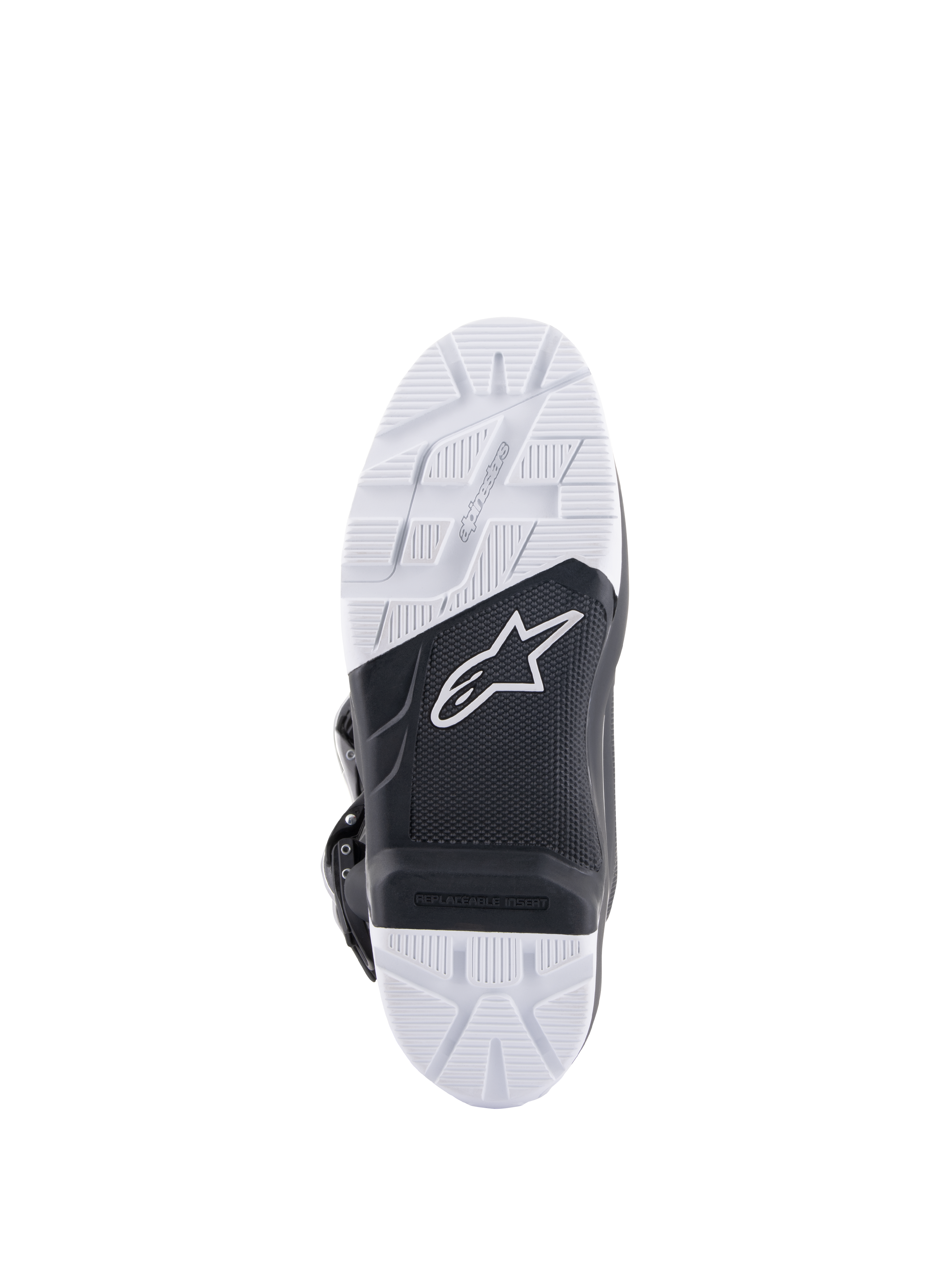 Bottes Alpinestars Tech 7 Enduro Drystar®, vue détaillée de la semelle, composé de caoutchouc double densité noir et blanc à haute adhérence, avec logo Alpinestars et insert de repose-pied remplaçable, conçue pour une traction tout-terrain et enduro