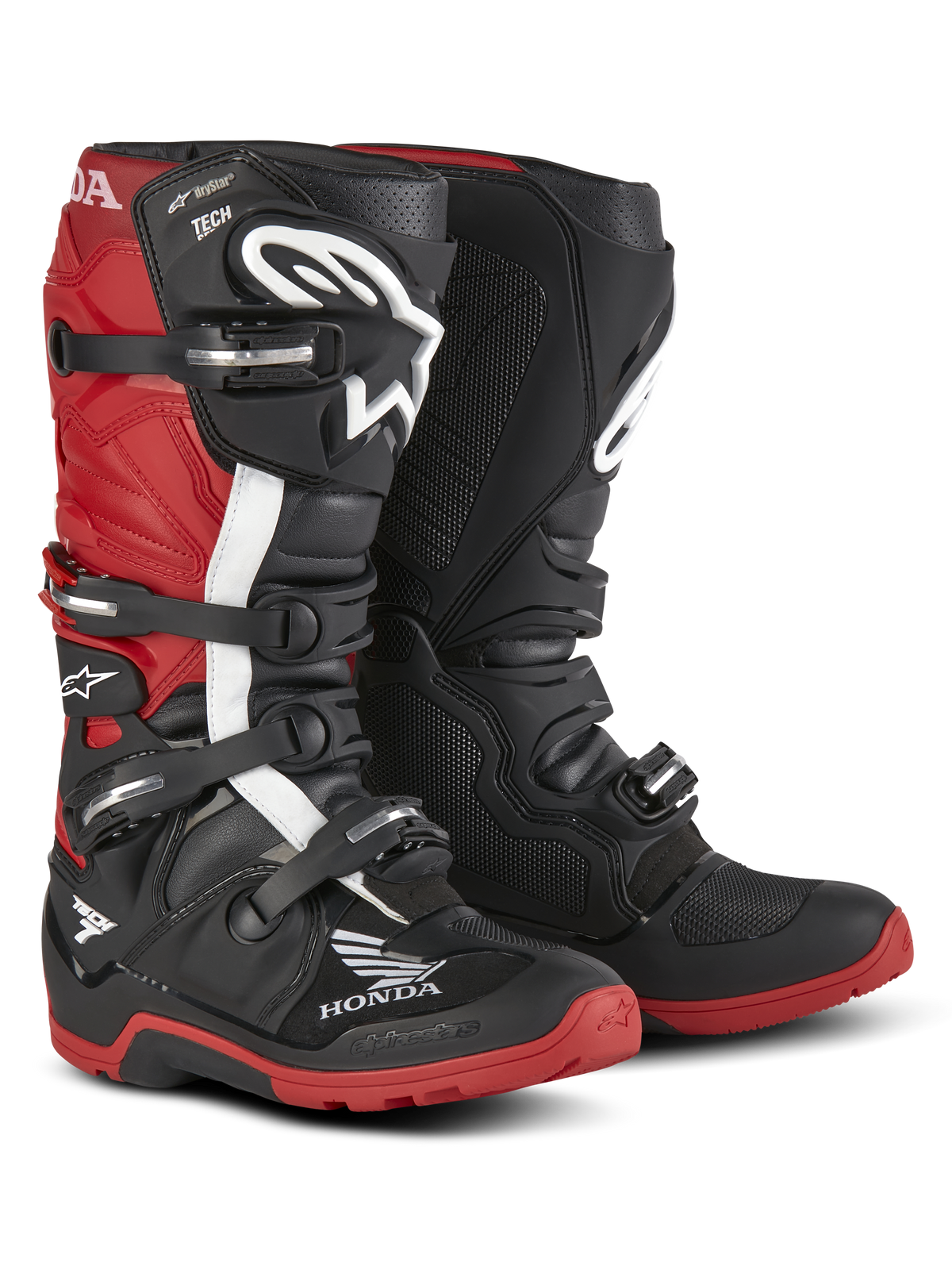 Bottes Alpinestars Honda Tech 7 Enduro Drystar®, bottes de moto d'enduro, noir et rouge vif, vue de trois-quarts avant avec système de fermeture à quatre boucles, protège-tibias et semelles rouges à haute adhérence, logos Honda et Alpinestars bien visibles.