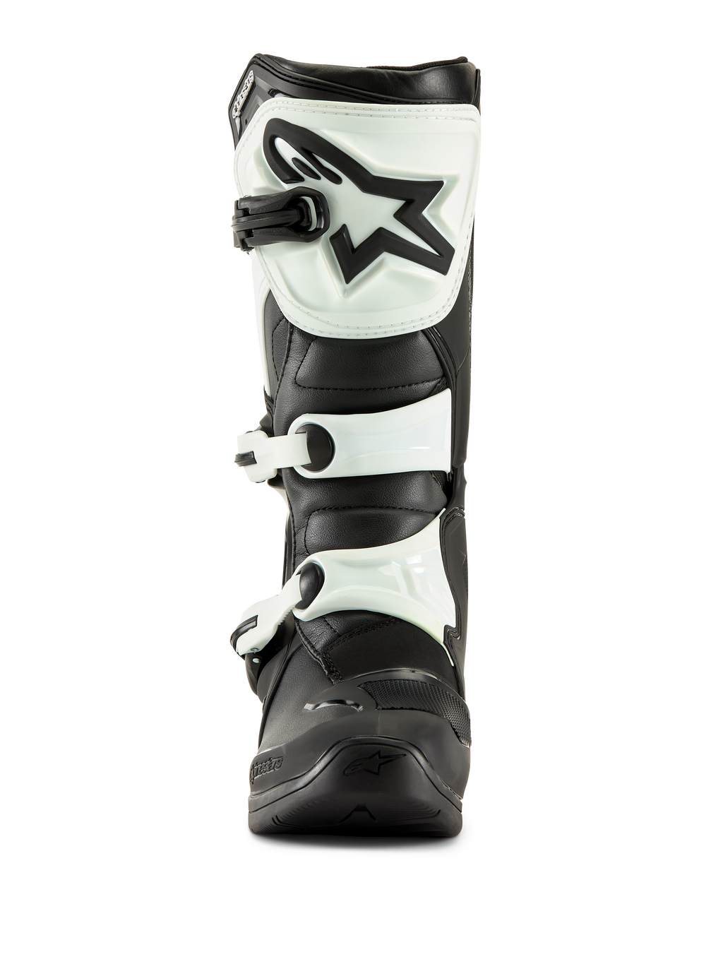 Bottes Alpinestars Tech 3, bottes de motocross, noir et blanc, vue de face montrant la plaque tibiale en TPU blanc avec logo étoile noir et sangles à boucles blanches, équipement tout-terrain durable