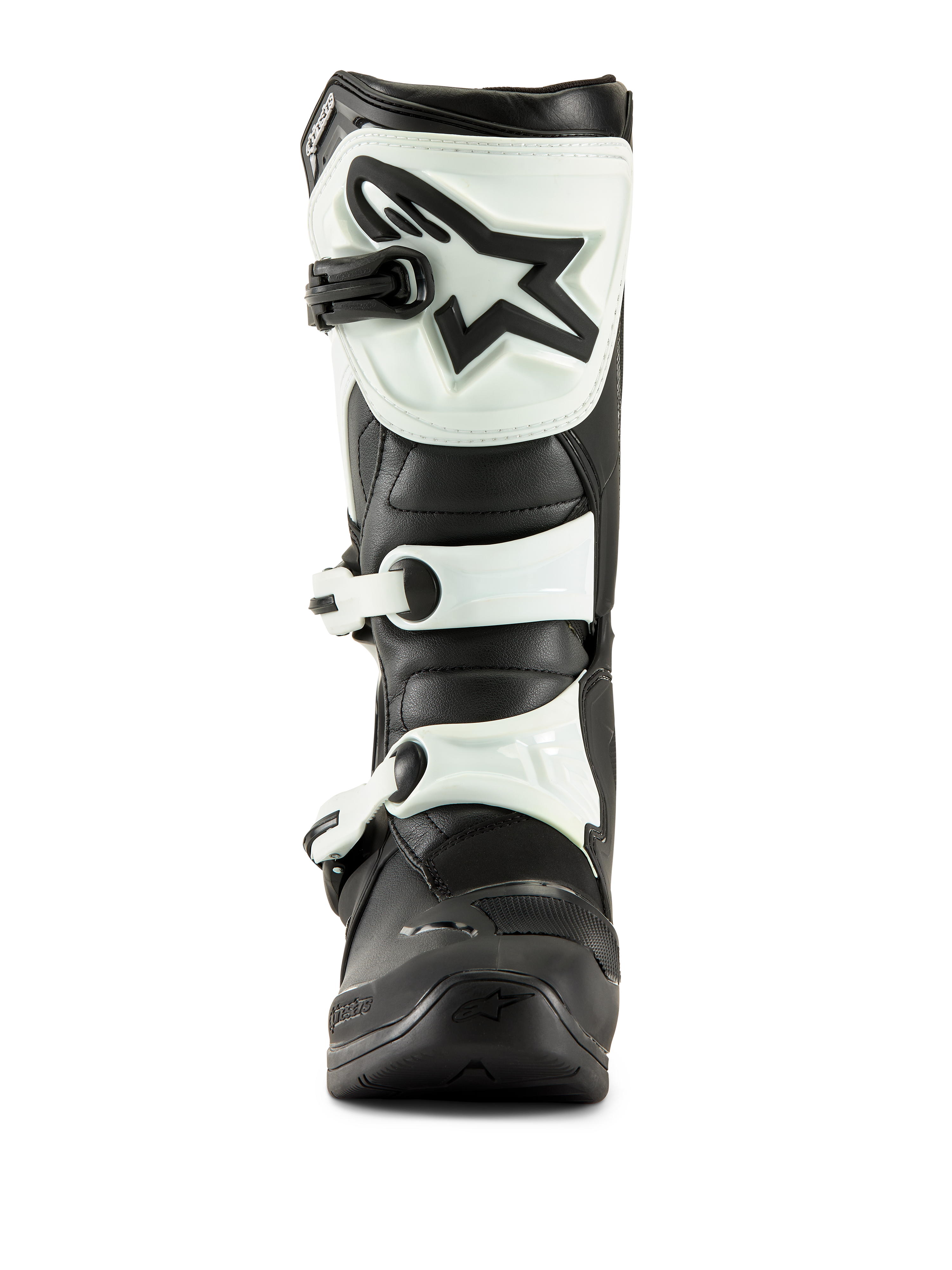 Bottes Alpinestars Tech 3, bottes de motocross, noir et blanc, vue de face montrant la plaque tibiale en TPU blanc avec logo étoile noir et sangles à boucles blanches, équipement tout-terrain durable