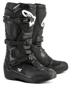 Bottes Alpinestars Tech 3, bottes de motocross noires, chaussures de performance tout-terrain, système de fermeture à trois boucles, plaque protège-tibia renforcée en TPU avec logo blanc, semelle durable à haute adhérence, construction en microfibre légère