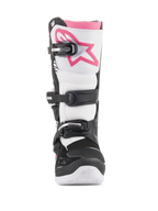 Alpinestars Stella Tech 3, bottes de motocross pour femme, noir, blanc et rose, vue de face présentant une plaque protège-tibia blanche avec un logo Astars rose, système de fermeture à boucles noires et revers supérieur rose, équipement de protection durable pour le tout-terrain