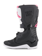 Bottes Alpinestars Stella Tech 3 pour femme, bottes de motocross, noir, blanc et rose, profil latéral avec plaque de tibia protectrice en TPU, panneaux de préhension texturés et marquage « TECH SERIES » pour la course tout-terrain