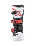 Bottes Alpinestars Youth Tech 3S, bottes de motocross, blanc, noir et rouge vif, vue de face montrant la plaque de tibia en TPU avec logo rouge, boucles rouges ajustables et construction en microfibre durable pour les jeunes pilotes