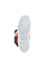 Bottes Alpinestars Youth Tech 3S, bottes de motocross, blanc, noir et rouge éclatant, vue de la semelle montrant le relief texturé blanc avec logo et marquage Alpinestars moulés, semelle durable pour des performances tout-terrain