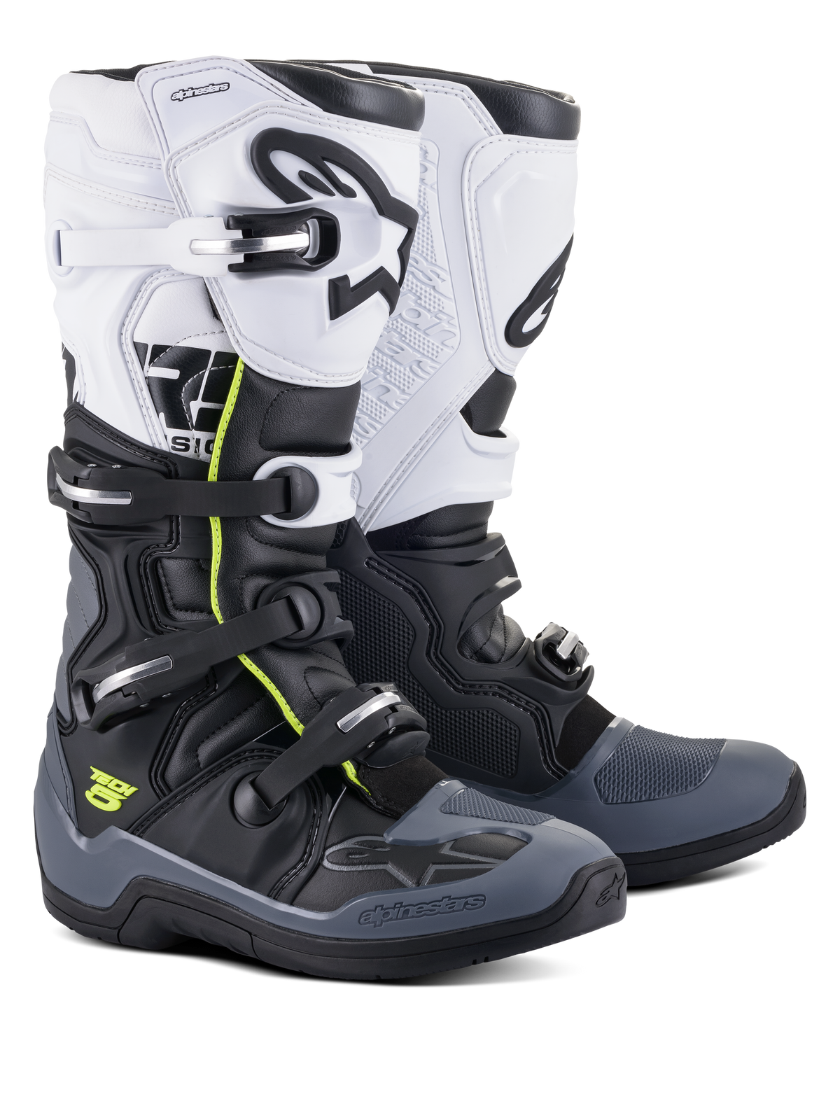 Bottes Alpinestars Tech 5, bottes de motocross et tout-terrain, noir, gris foncé et blanc, avec des accents jaune fluo, système de fermeture à quatre boucles, panneau supérieur blanc avec logo Astars noir, protection des orteils et du talon gris foncé, et construction en microfibre durable