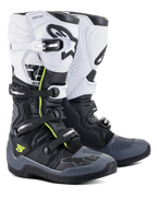 Bottes Alpinestars Tech 5, bottes de motocross et tout-terrain, noir, gris foncé et blanc, avec des accents jaune fluo, système de fermeture à quatre boucles, panneau supérieur blanc avec logo Astars noir, protection des orteils et du talon gris foncé, et construction en microfibre durable