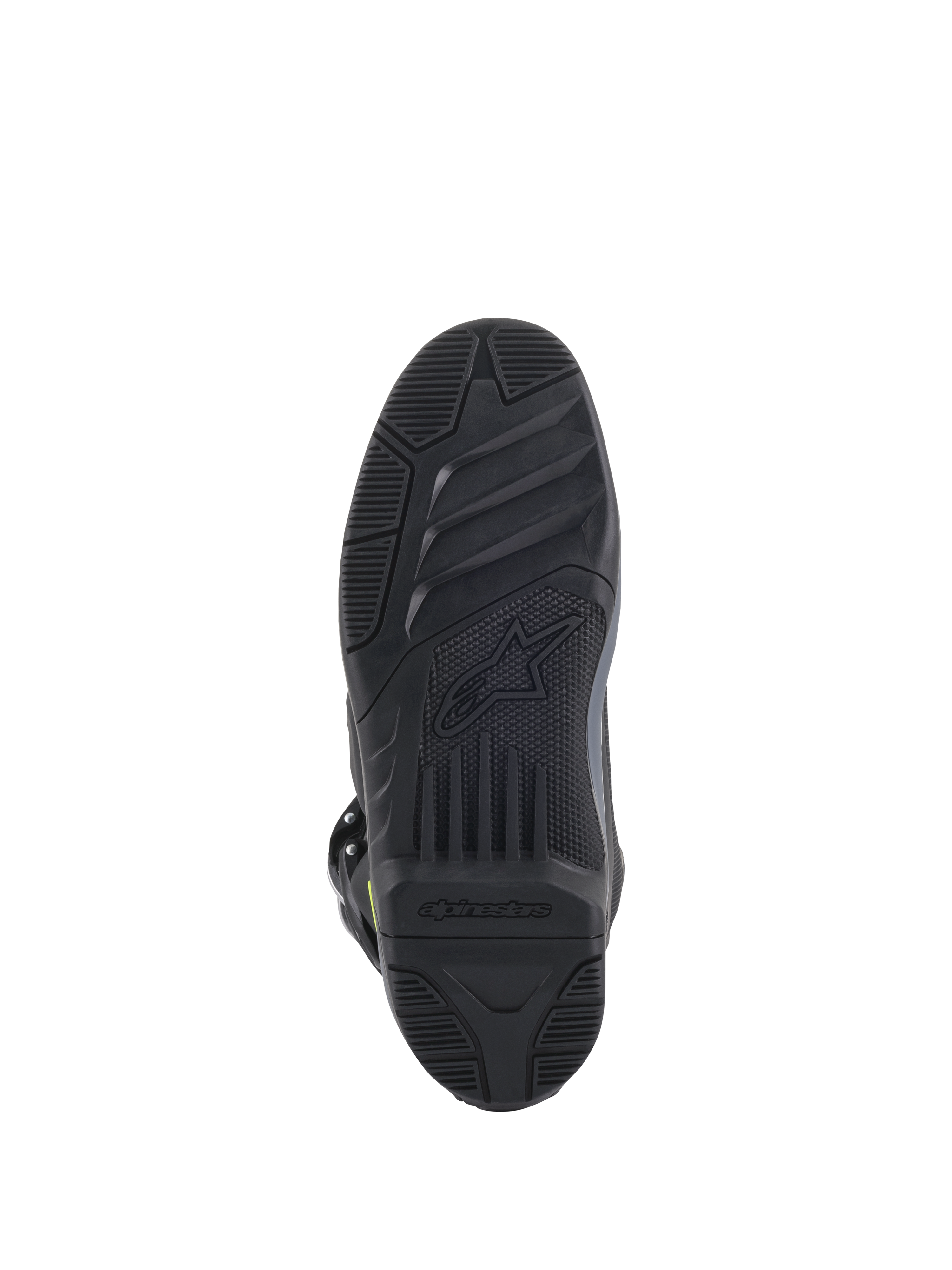 Bottes Alpinestars Tech 5, vue de la semelle, noires, motif de semelle texturé pour une adhérence tout-terrain, avec logo et symbole d'étoile Alpinestars embossés, chaussure de motocross à construction durable