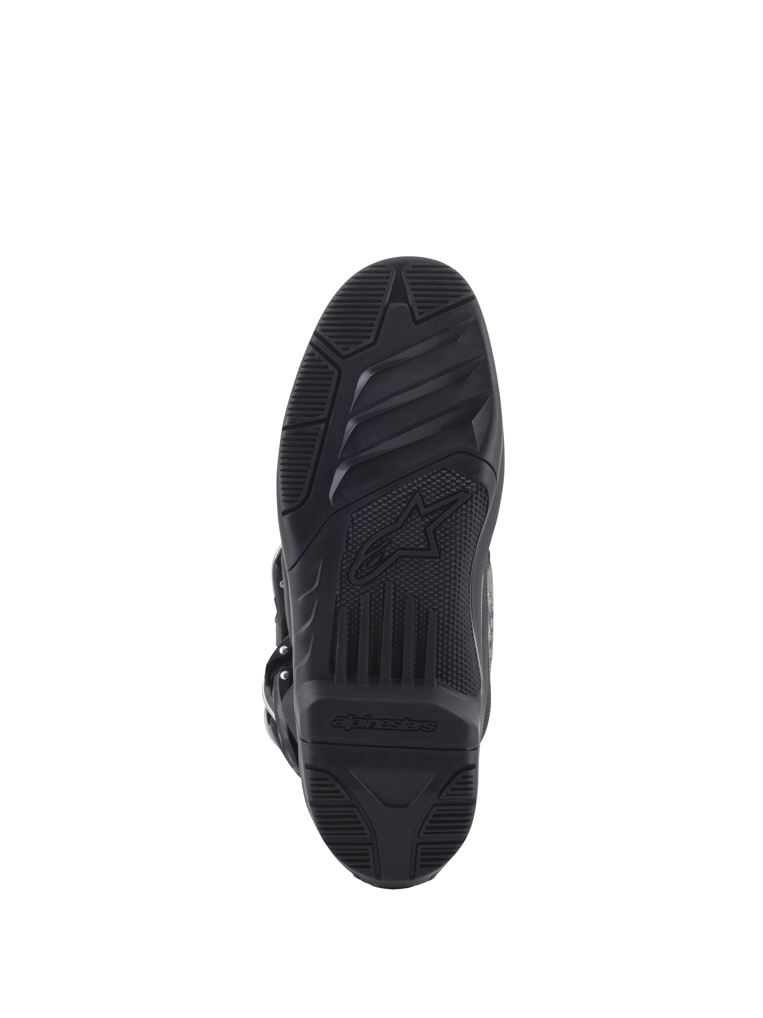 Bottes Alpinestars Tech 5, vue de dessous de la semelle, caoutchouc noir avec motifs d'adhérence texturés, arborant le logo étoile et la marque Alpinestars, conception durable pour la traction en motocross et tout-terrain