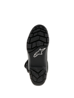 Bottes Alpinestars Belize Drystar®, bottes de moto Adventure Touring, vue de dessous montrant la semelle extérieure en caoutchouc vulcanisé noir avec motif à crampons pour une adhérence supérieure et logo étoile Alpinestars blanc