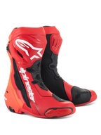 Bottes Alpinestars Supertech R, bottes de course moto, rouge vif et rouge fluo avec des accents noirs et blancs, dotées de logos Alpinestars blancs sur le tibia, de plaques de protection renforcées et de sliders d'orteils remplaçables, chaussures haute performance pour le sport et la course.