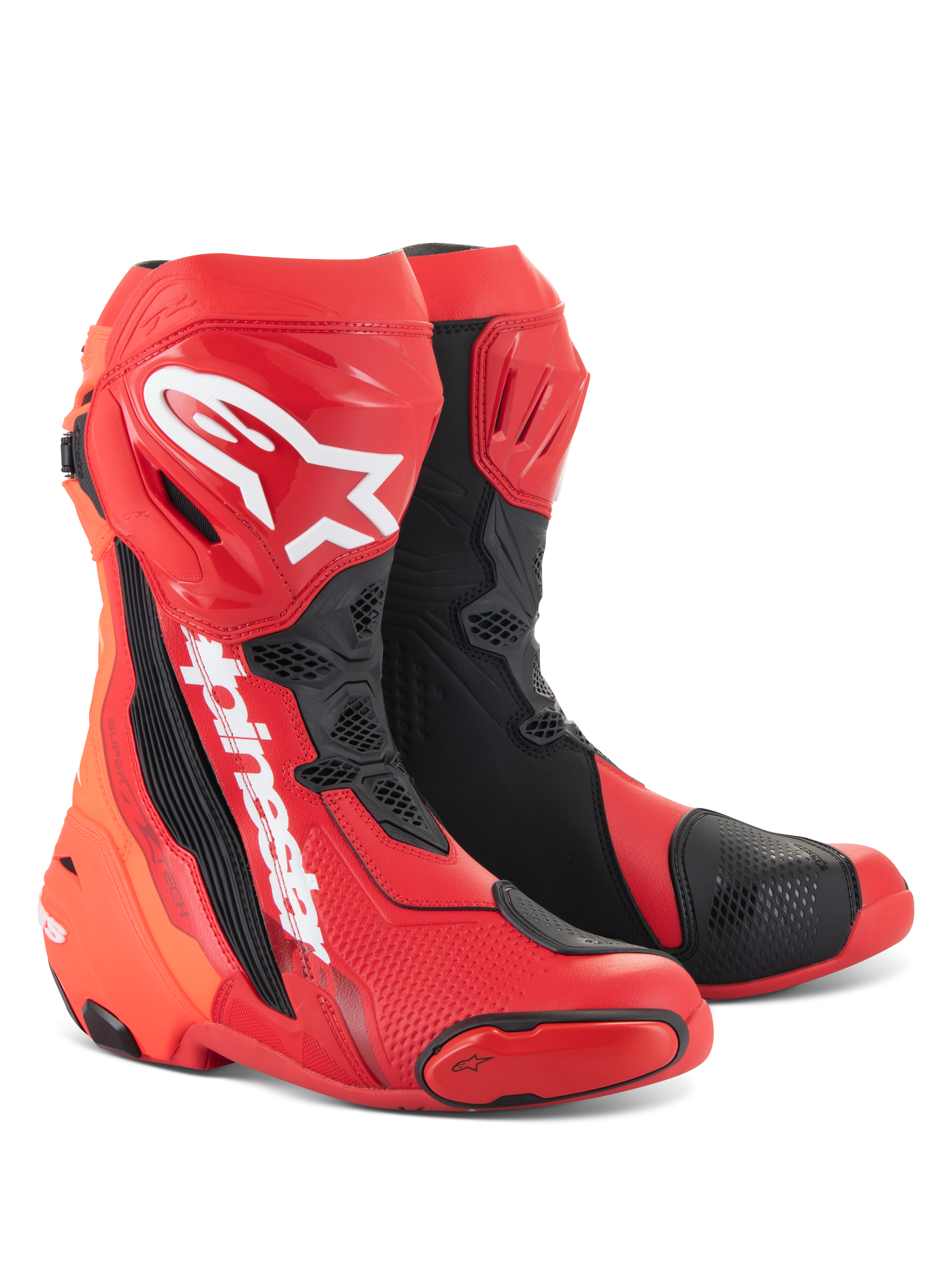 Bottes Alpinestars Supertech R, bottes de course moto, rouge vif et rouge fluo avec des accents noirs et blancs, dotées de logos Alpinestars blancs sur le tibia, de plaques de protection renforcées et de sliders d'orteils remplaçables, chaussures haute performance pour le sport et la course.