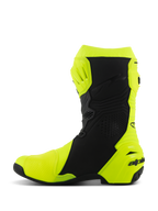 Bottes Alpinestars Supertech R, bottes de course moto, jaune fluo et noir, profil latéral avec protection renforcée du tibia et du talon, design ergonomique épuré avec panneaux perforés et logo sur le talon.