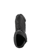 Bottes Alpinestars Supertech R Vented, noir et blanc, vue de dessus mettant en évidence le châssis perforé pour la circulation de l'air, la protection de sélecteur en TPU et l'ouverture ergonomique, botte de moto de course professionnelle.