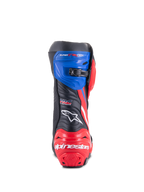 Bottes Alpinestars Honda Supertech R, bottes de course moto, noir, rouge vif et bleu, vue arrière avec talon renforcé rouge et marquage blanc, guêtre supérieure bleue avec fermeture à cliquet micro-ajustable et logo HRC à l'arrière