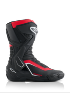 Bottes Alpinestars Honda SMX-6 V3, bottes de pilotage haute performance, noir, rouge vif et blanc, vue latérale montrant la construction en microfibre avec protection en TPU, renfort latéral de cheville et marquage Honda, équipement professionnel de route et de course moto