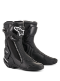 Bottes Alpinestars SMX Plus V2, bottes de course moto, noires avec logo blanc sur le tibia, design montant, sliders d'orteils renforcés et protection du talon, fermeture éclair latérale, panneaux accordéon nervurés pour la flexibilité, construction aérodynamique