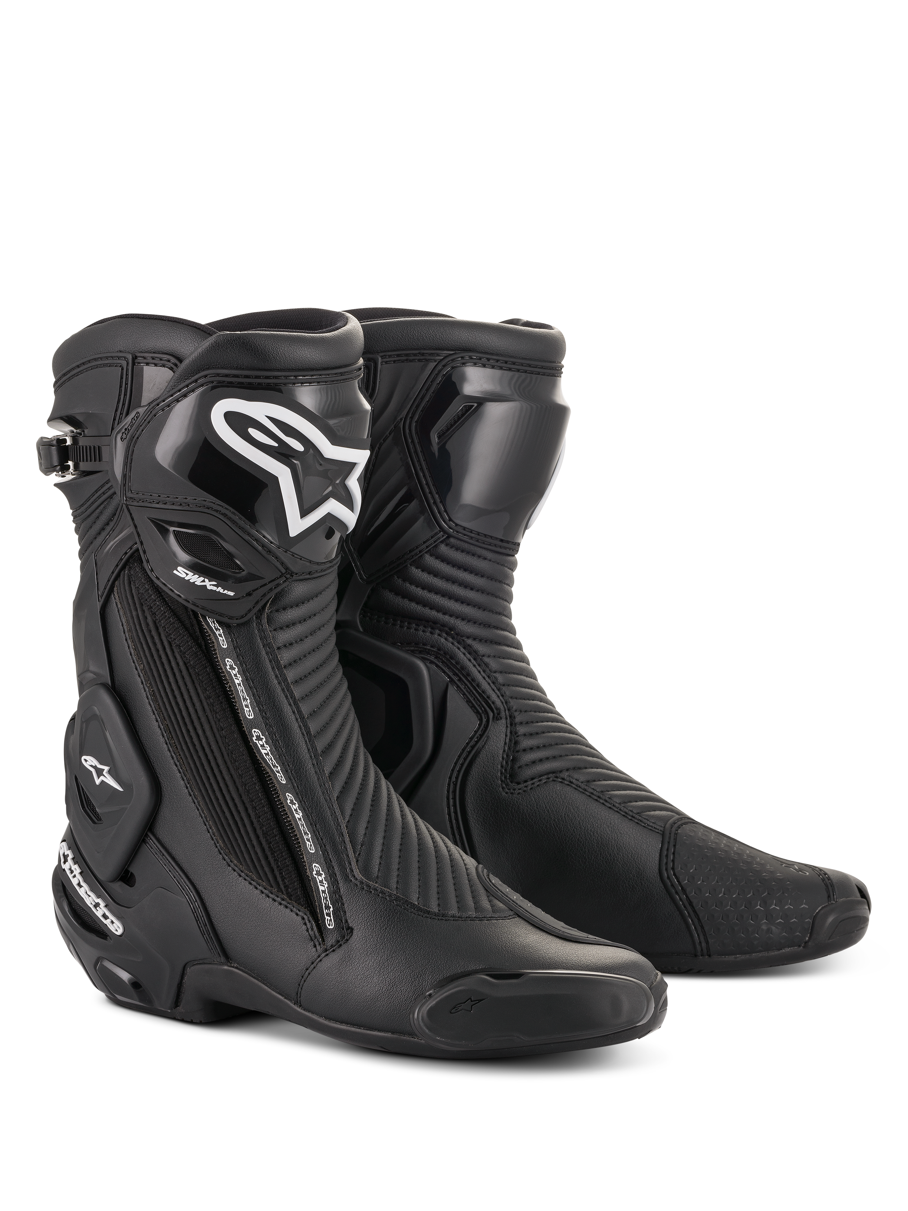 Bottes Alpinestars SMX Plus V2, bottes de course moto, noires avec logo blanc sur le tibia, design montant, sliders d'orteils renforcés et protection du talon, fermeture éclair latérale, panneaux accordéon nervurés pour la flexibilité, construction aérodynamique