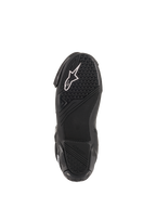 Alpinestars SMX Plus V2, bottes de moto racing pour homme, noires et blanches, vue de la semelle en caoutchouc noir texturé à haute adhérence