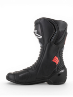Alpinestars SMX-6 V2 Ventilées, bottes racing de moto noires avec détails gris et rouges fluorescents, panneaux en mesh respirant et protections de cheville et de tibia
