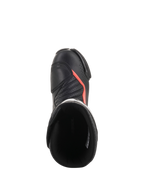 Alpinestars Bottes SMX-6 V2 Ventilées, bottes racing de moto noires avec détails rouges fluorescents, vue de dessus montrant la tige perforée, la protection de la cheville et l’ouverture de la botte