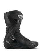 Bottes Alpinestars SMX-6 V3, bottes de moto de performance, noires avec accents blancs, vue de profil latéral présentant un système de protection de cheville en TPU, des zones de flexion en mesh texturé et des composants renforcés au talon et aux orteils pour une performance sur piste et sur route.