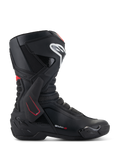 Bottes Alpinestars SMX-6 V3, bottes de moto de course, noires avec accents blancs et rouges, vue latérale présentant l'attelle de cheville en TPU, logo de tibia blanc et zones de flexion en mesh texturé, design aérodynamique sportif