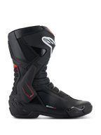 Bottes Alpinestars SMX-6 V3, bottes de moto de course, noires avec accents blancs et rouges, vue latérale présentant l'attelle de cheville en TPU, logo de tibia blanc et zones de flexion en mesh texturé, design aérodynamique sportif