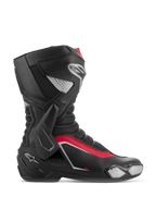 Bottes Alpinestars SMX-6 V3, bottes de course moto, noir, argent et rouge, vue de profil montrant la protection latérale de cheville en TPU, le slider d'orteil remplaçable et les zones de flexion en mesh pour la performance sur piste et sur route.