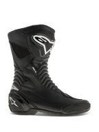 Alpinestars SMX S Boots, Motorcycle Racing Boots, Black with White logos, side profile view featuring durable microfiber construction, reinforced shin and heel protection, flexible accordion flex zones, and a sleek aerodynamic design for sport riding.